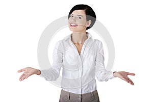 Beautiful business woman showing copy space