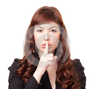 Beautiful business woman shushing