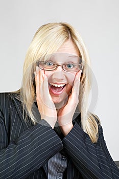 Beautiful business woman is surprised in offic