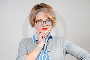 Beautiful business woman thinking of her plans.