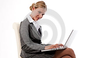 Beautiful business woman working on her laptop