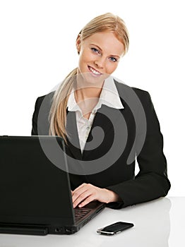 Beautiful business woman working on laptop