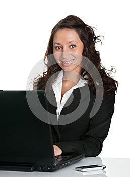 Beautiful business woman working on laptop