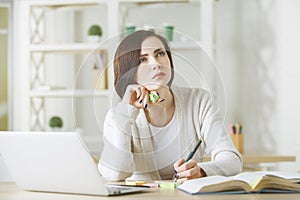 Beautiful business woman working on project