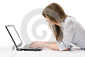 Beautiful businesswoman with a laptop working.