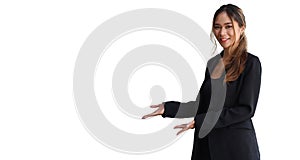 Beautiful businesswoman outstretching her hand for presenting something. Copy space area for advertise or text message.