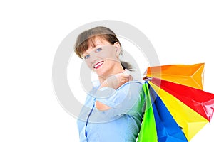 Beautiful businesswoman with shopping bas