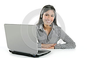 Beautiful businesswoman talking with headset
