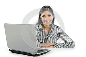 Beautiful businesswoman talking with headset