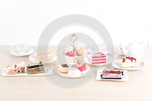 Beautiful cake and dessert on wooden table in pastel color - soft focus