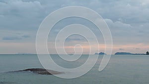 Beautiful Calm Blue Sea And Cloudy Sky At Sunset