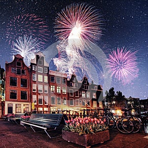 Beautiful calm night view of Amsterdam city. Colorful fireworks