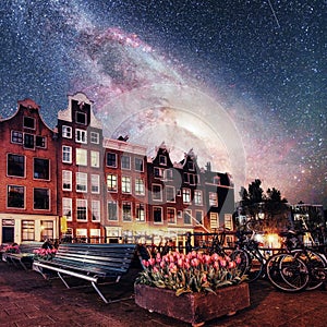 Beautiful calm night view of Amsterdam city. Photo greeting card