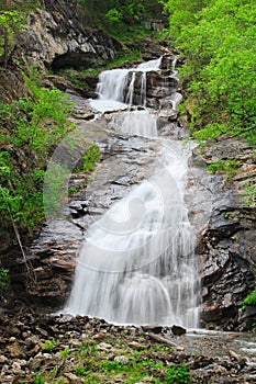A beautiful , calm waterfall in Northern Norway