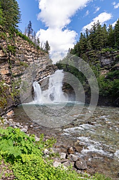 Beautiful Cameron Falls waterfall in Waterton Lakes National Park Canada photo