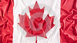 A beautiful Canada national flag cloth fabric, a sign or symbol of Canada day concept