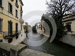 Beautiful canal along the street in Padua