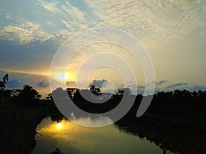 beautiful canal side sunset landscape image