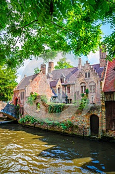 Beautiful canal and traditional houses in the old town of Bruges Brugge, Belgium