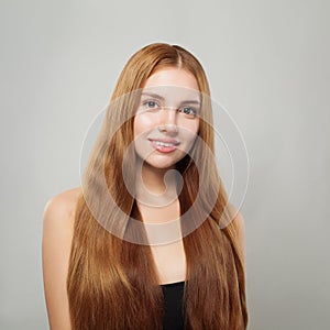 Beautiful candid girl with healthy hair portrait. Cute young woman with long natural hair