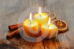 Beautiful candles and juicy oranges