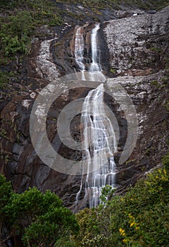 Beautiful Caparao Park Waterfall with Silky Flowing Water over Solid Stone Wall