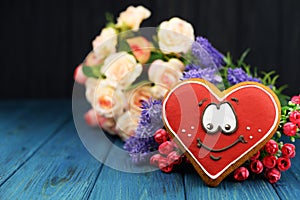 Beautiful card with a red heart smiley cookies on the background