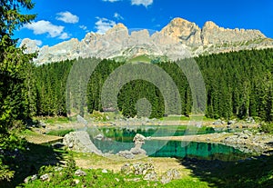 Beautiful Carezza lake,(Lago di Carezza) in the forest,Dolomites,Italy