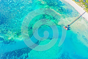 Beautiful caribbean beach in Dominican Republic. Aerial abstract view of tropical idyllic summer landscape with clear transparent