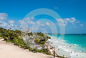 Beautiful Caribbean coastline and ancient Mayan ruins of Tulum overlooking beach in Mexico