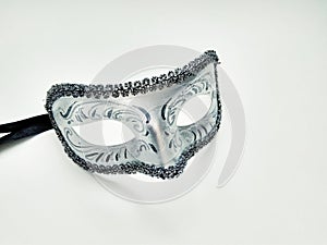 Beautiful carnival silver mask with patterns on white background