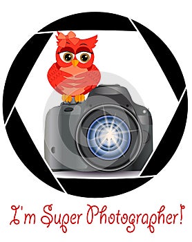 Beautiful cartoon red owl sits on the button Start the camera in the frame of the camera's aperture. Concept photography,