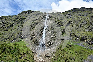 Beautiful cascade on the way to Kangchenjunga basecamp, Nepal photo