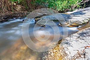 beautiful cascading waterfall over rocks long exposure in Chiangmai Chiang mai mountains northern thailand