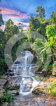 beautiful cascading waterfall over rocks long exposure in Chiangmai Chiang mai mountains northern thailand