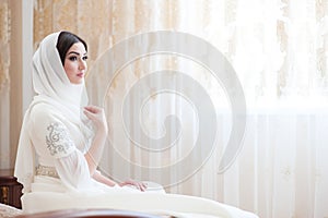 Beautiful caucasian bride in traditional dress