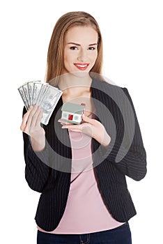 Beautiful caucasian business woman holding dollar curency and money.