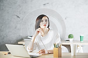 Beautiful caucasian business woman working on project