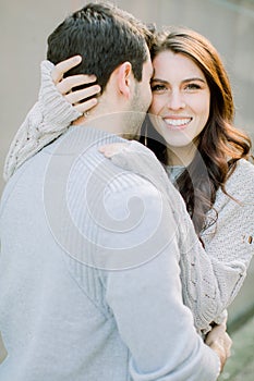 A happy young couple having a romantic moment in an urban setting in West Village in NYC