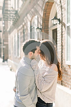 A happy young couple having a romantic moment in an urban setting in West Village in NYC