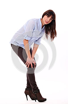 Beautiful caucasian woman feels pain in knee