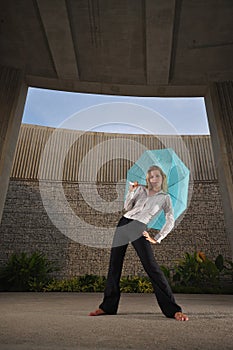 Beautiful Caucasian Woman Holding An Umbrella