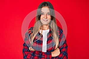 Beautiful caucasian woman wearing casual clothes happy face smiling with crossed arms looking at the camera