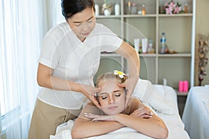 Beautiful caucasian women sleeping rest relax on bed for spa asia massage at luxury spa salon and relaxation.