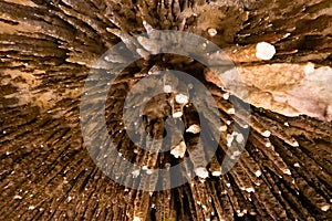 Beautiful cave interior with ancient stalactites and stalagmites