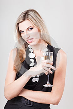 Beautiful model portrait over studio white background hold wine glass