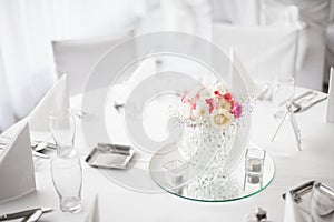 Beautiful centerpiece flower decoration on dining table