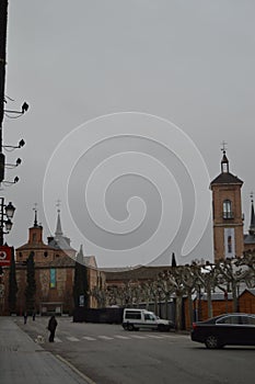 Beautiful Cervantes Square With Its Pretty Christmas Tree On A Rainy Day In Alcala De Henares. January 1, 2014. Alcala De Henares