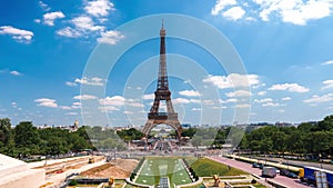 Beautiful Champ de Mars and the Eiffel Tower timelapse on a sunny summer day in Paris, France.