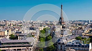 Beautiful Champ de Mars and the Eiffel Tower timelapse on a sunny summer day in Paris, France.